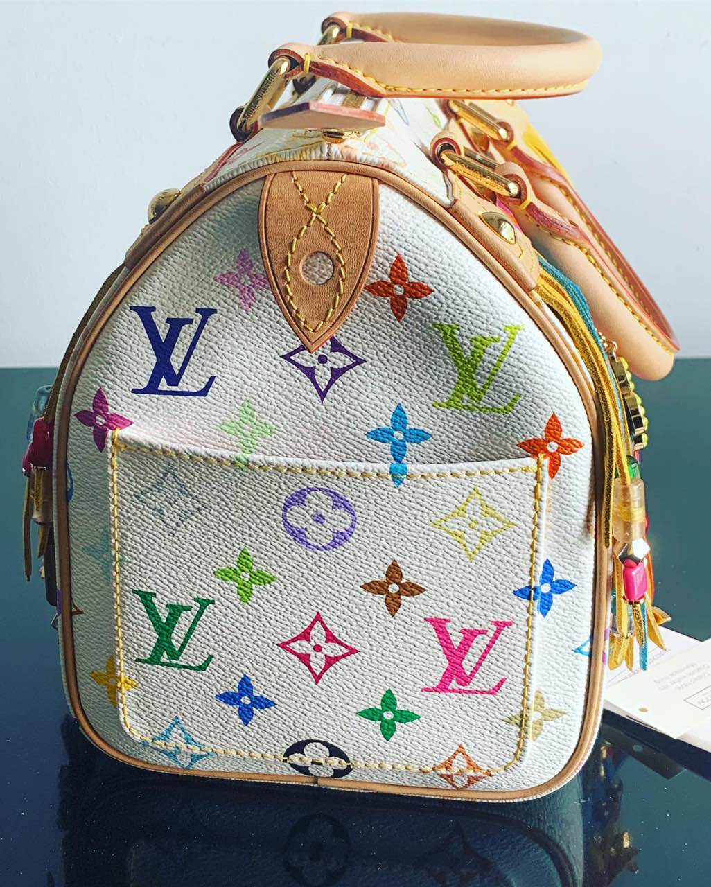 Vintage Louis Vuitton White Multicolor Fringe Bucket Bag – Madison